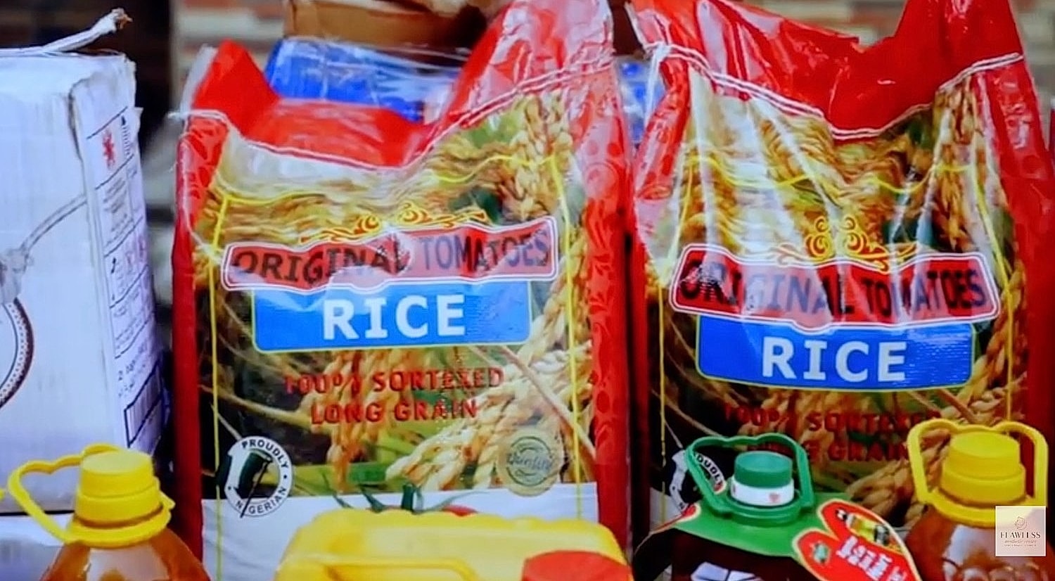 Bags of rice and condiments on display.